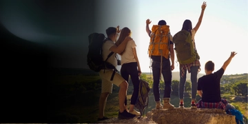 People celebrating on a mountain